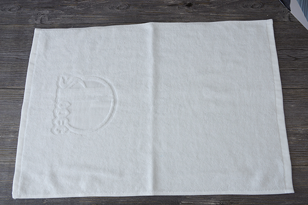 Pakistan cotton plain hand towels with jacquard logo for bath